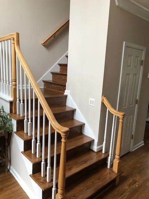 Stairwell with white railing