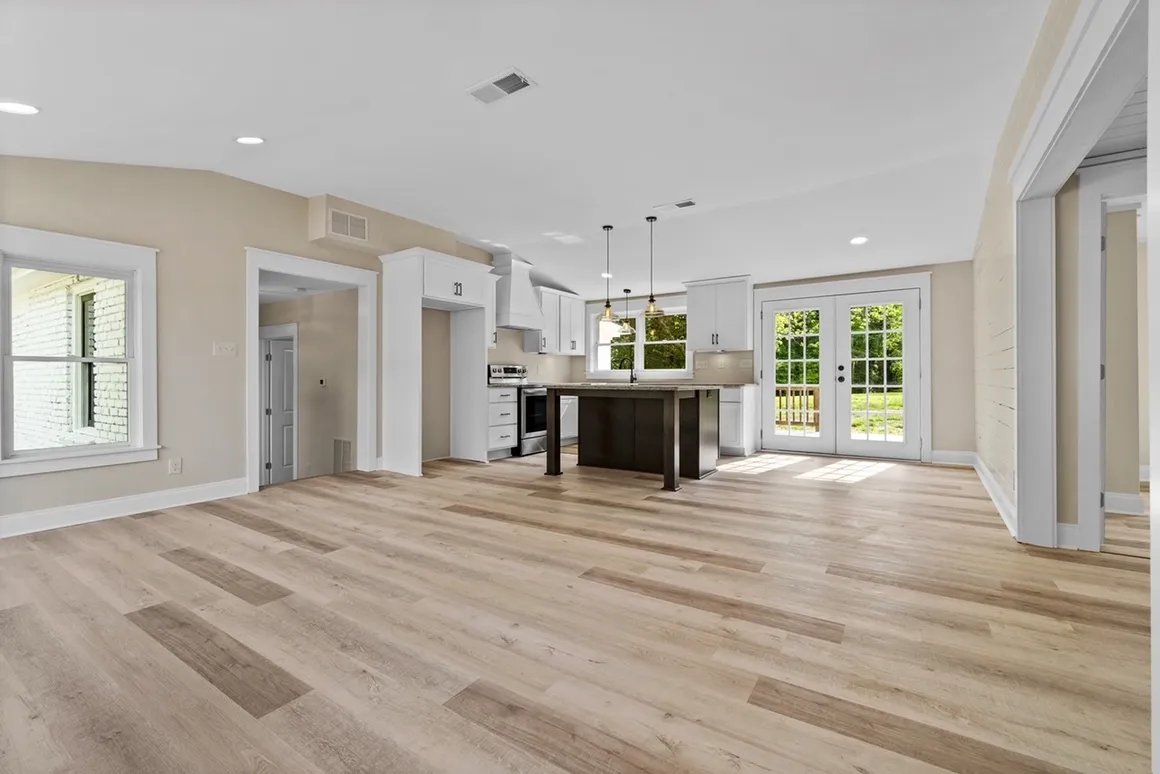 Open living and kitchen with fireplace