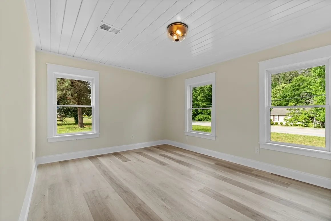 Open dining and kitchen with chandelier