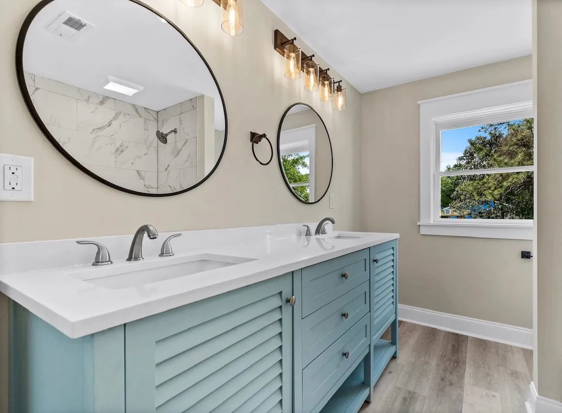 Powder room with blue vanity