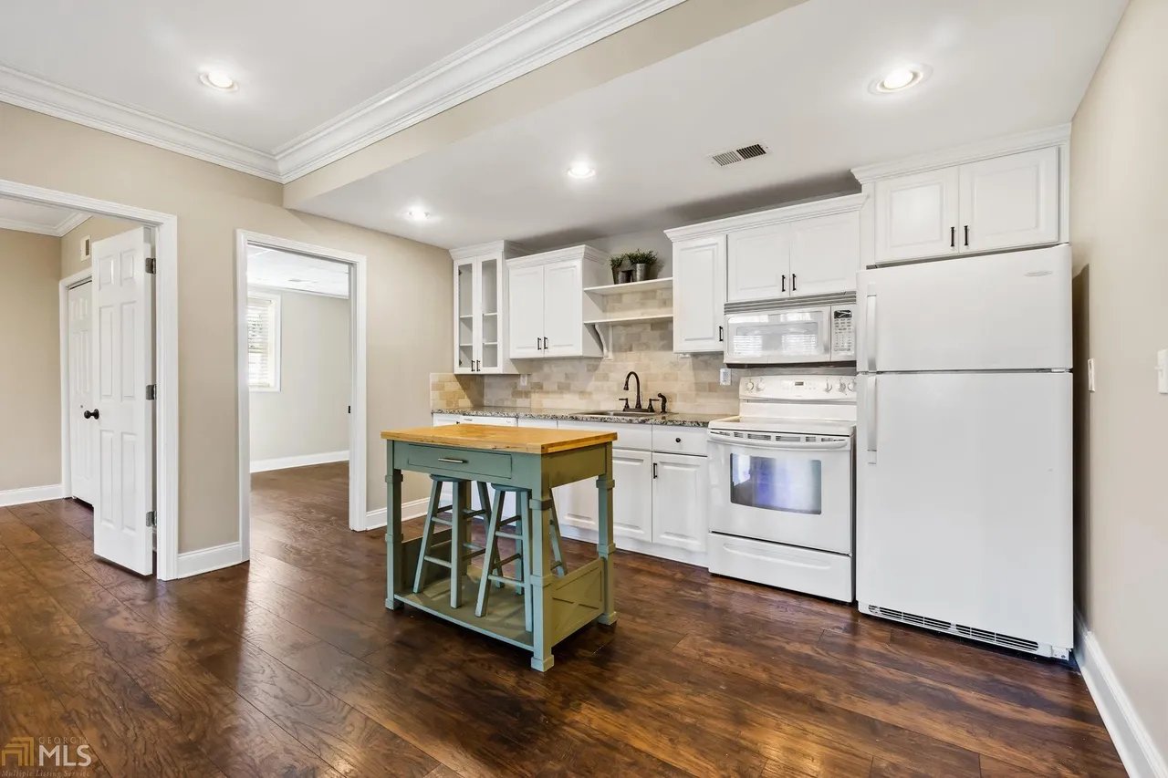 Kitchen with island and stainless appliances